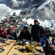 Chefs and trekkers sharing Nepali cuisine at One Star Restaurant at Everest Base Camp – Mountain King Treks