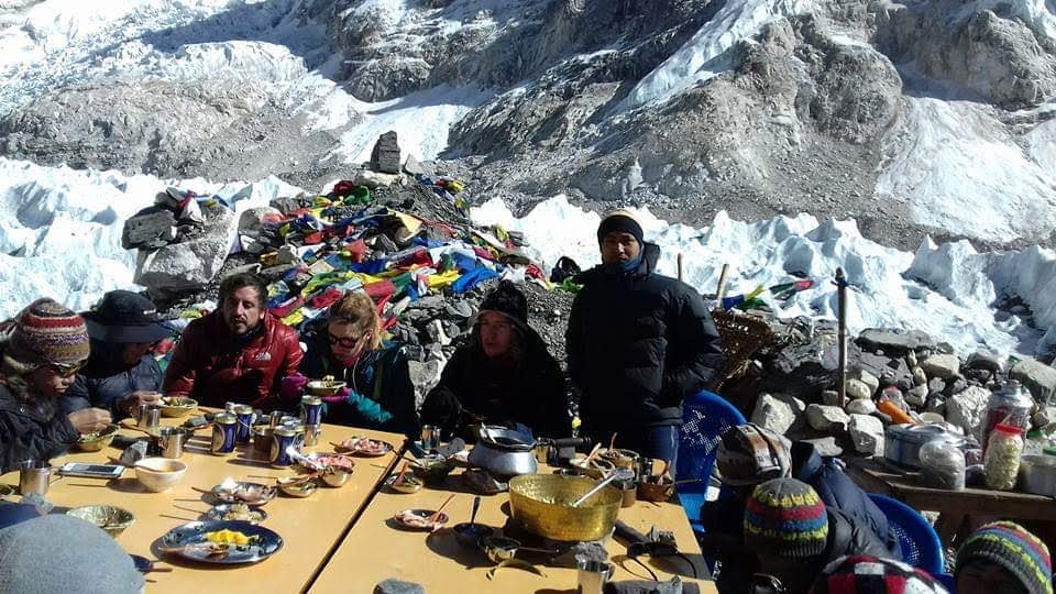 Chefs and trekkers sharing Nepali cuisine at One Star Restaurant at Everest Base Camp – Mountain King Treks