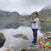 Pilgrims performing Namaste and puja at Gosainkunda Lake during Janai Purnima Festival, Nepal
