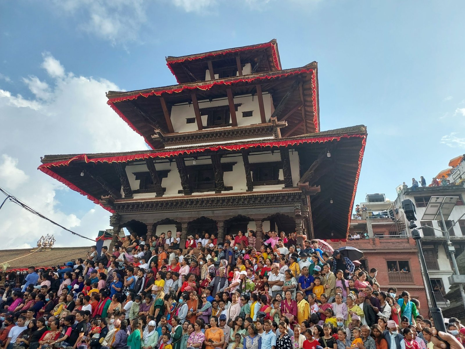 Thousands of people watching Indra Jatra Festival chariot procession at Kathmandu Durbar Square, Nepal