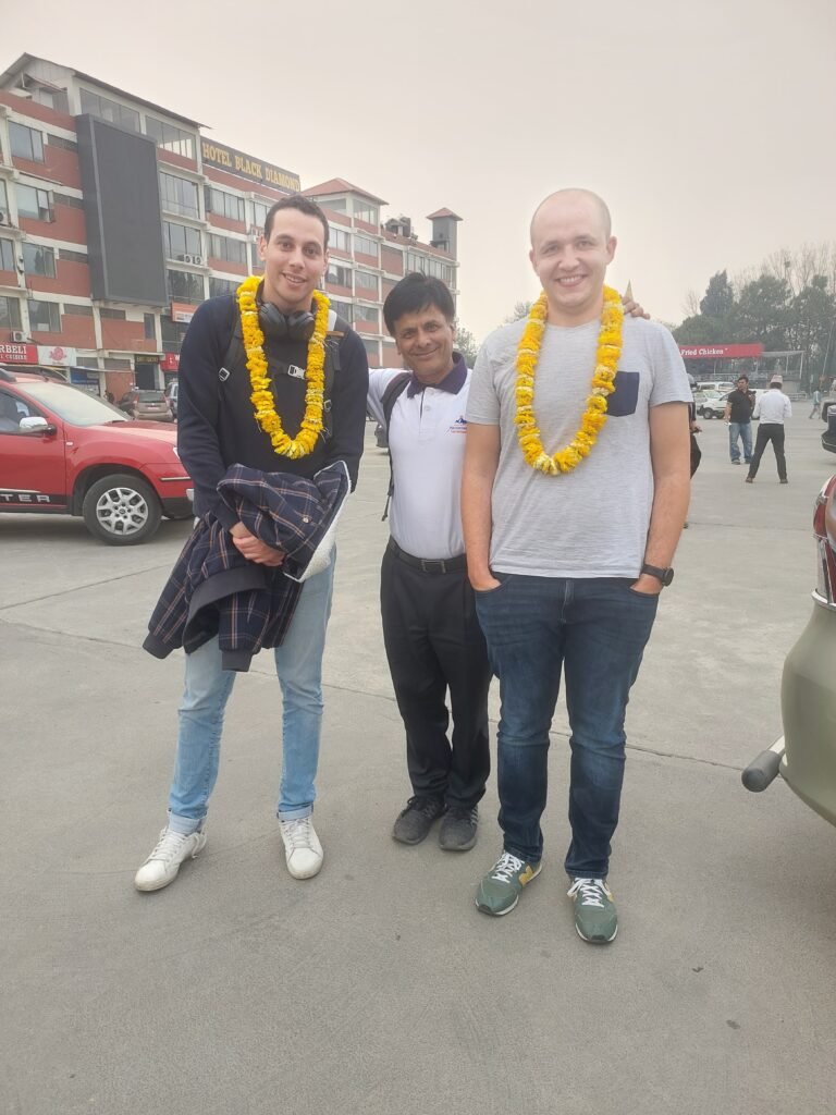 French group upon arrival after a warm meet-and-greet with Nepali hospitality, taking a group picture at Tribhuvan International Airport, Kathmandu. Celebrating World Tourism Day 2025: Travel for Inclusive Growth, this moment reflects cultural connection and the spirit of inclusive tourism.