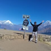 Panoramic sunrise view of Dhaulagiri and Annapurna mountains from Poon Hill viewpoint during the Poon Hill Trek in Nepal.